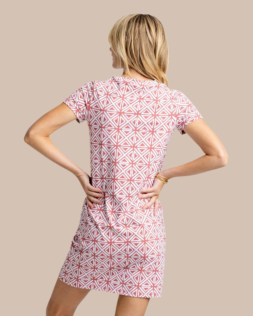 The back view of the Southern Tide Chanelle Painted Geo Performance Dress by Southern Tide - Dusty Coral