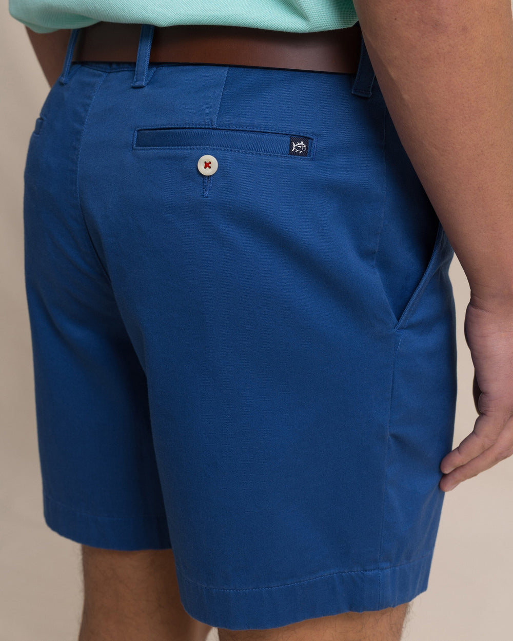 The detail view of the Southern Tide Channel Marker 7" Stretch Chino Short by Southern Tide - Nautical Blue