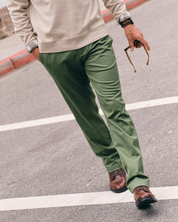 The lifestyle view of the Southern Tide Channel Marker Stretch Chino Pant by Southern Tide - Cedar Green