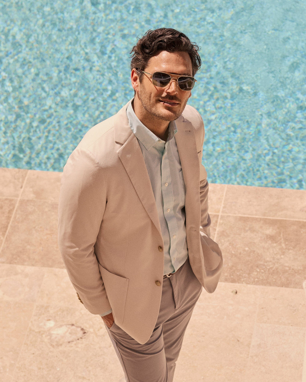 The lifestyle view of the Southern Tide Charleston Blazer by Southern Tide - Perfectly Pale Khaki