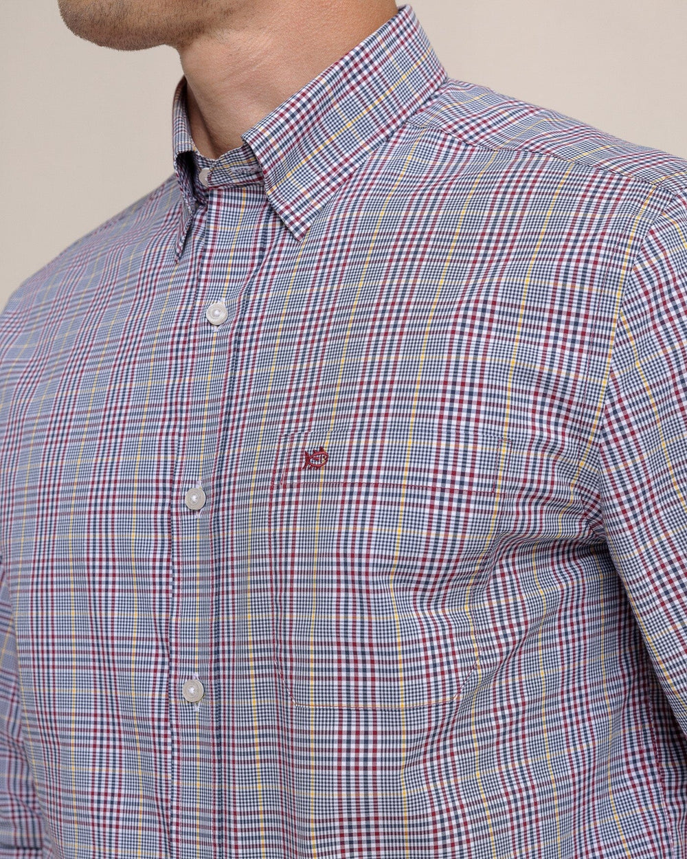 The detail view of the Southern Tide Charleston Brunswick Plaid Long Sleeve Sport Shirt - Muscadine