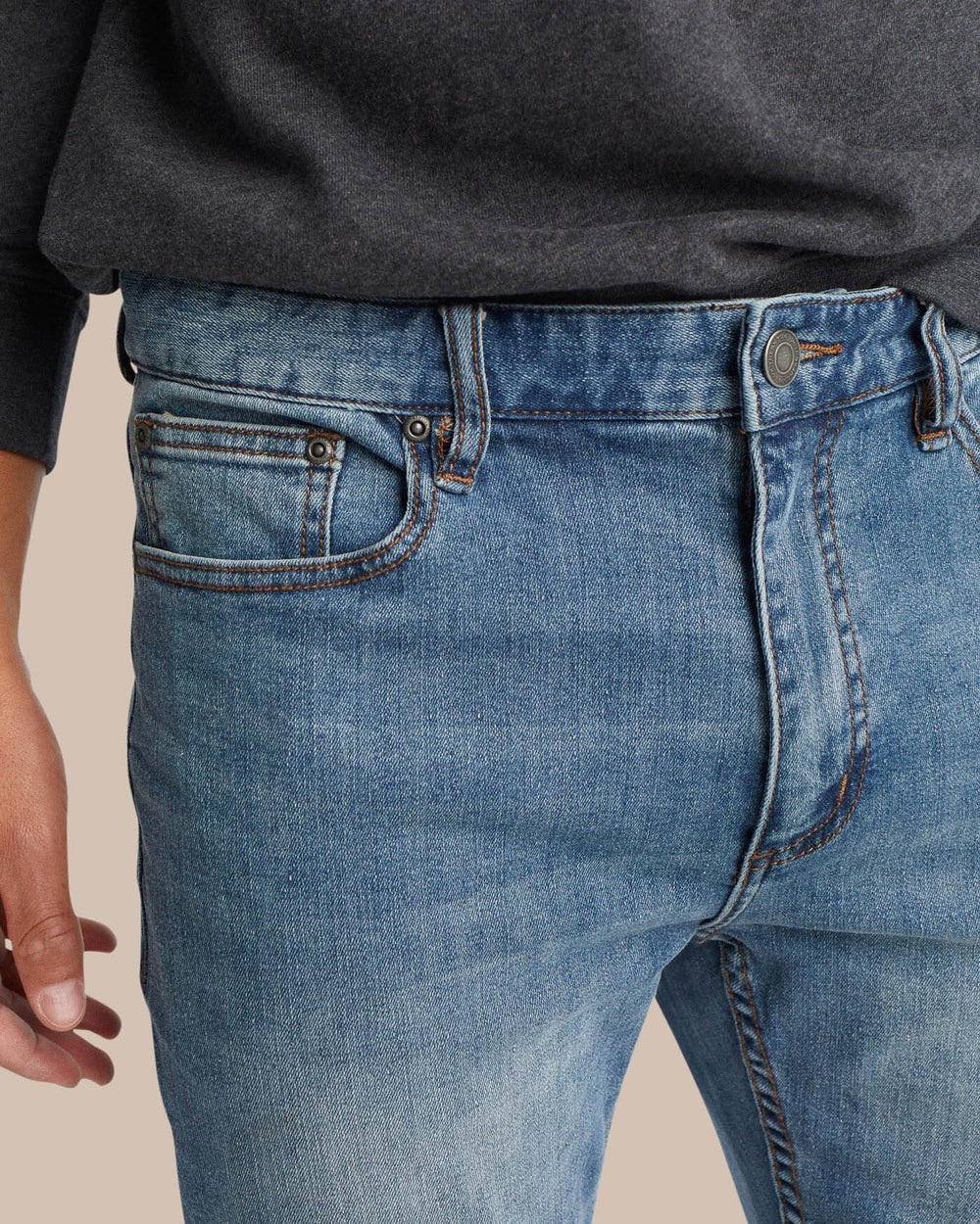 The detail of the Men's Blue Denim Charleston Denim Jeans by Southern Tide - Medium Wash