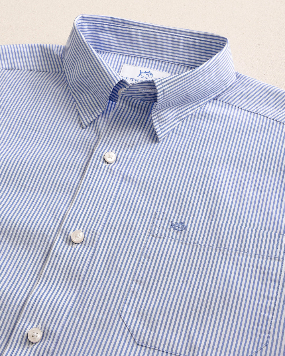 The detail view of the Southern Tide Charleston Granby Stripe Embroidered Sport Shirt by Southern Tide - Cobalt Blue