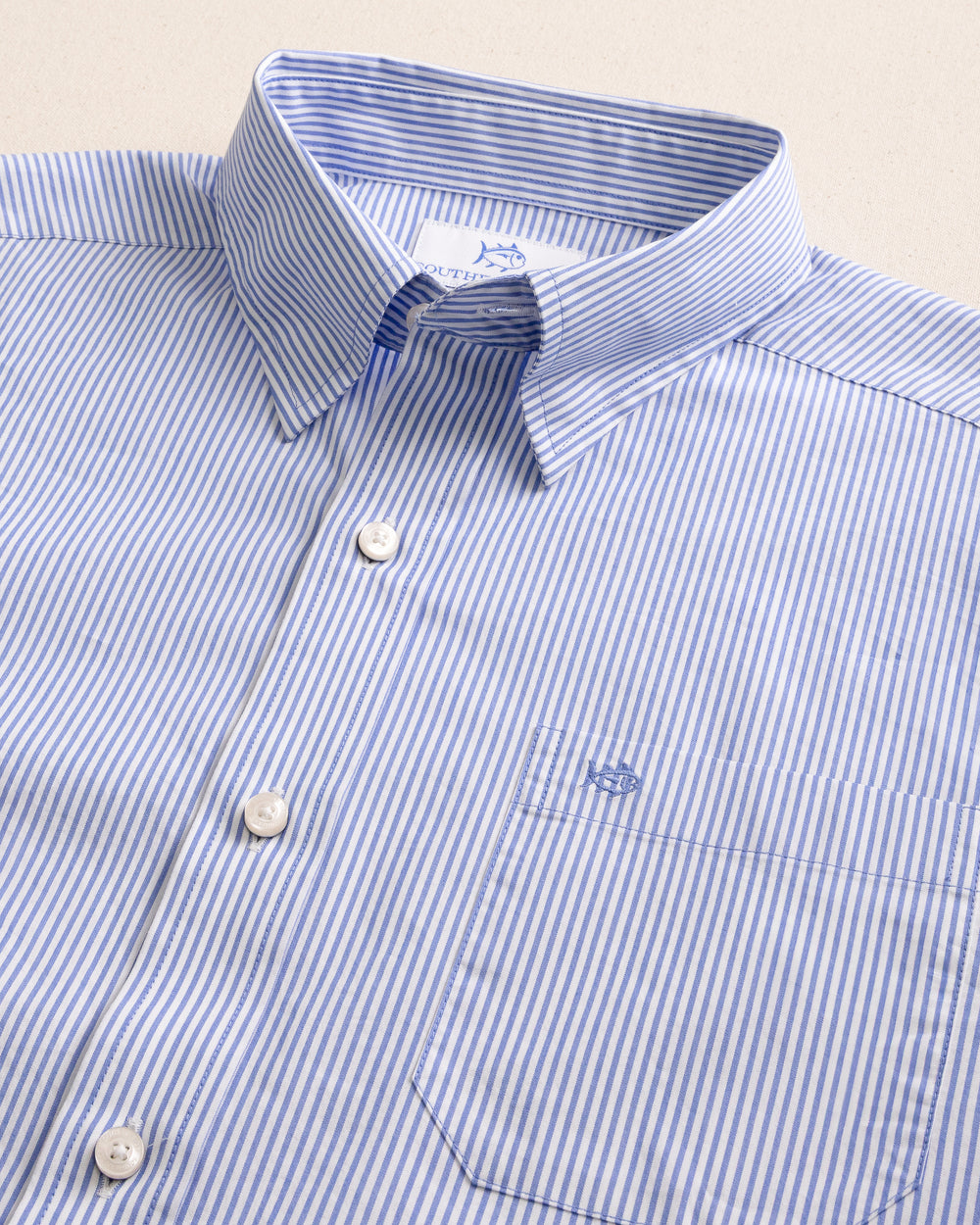 The detail view of the Southern Tide Charleston Granby Stripe Long Sleeve Sport Shirt by Southern Tide - Cobalt Blue