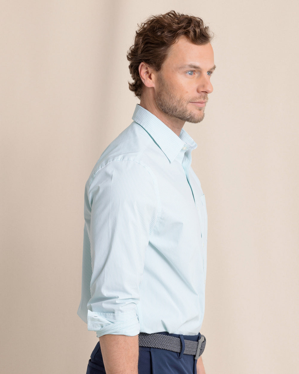 The side view of the Southern Tide Charleston Granby Stripe Long Sleeve Sport Shirt by Southern Tide - Mint