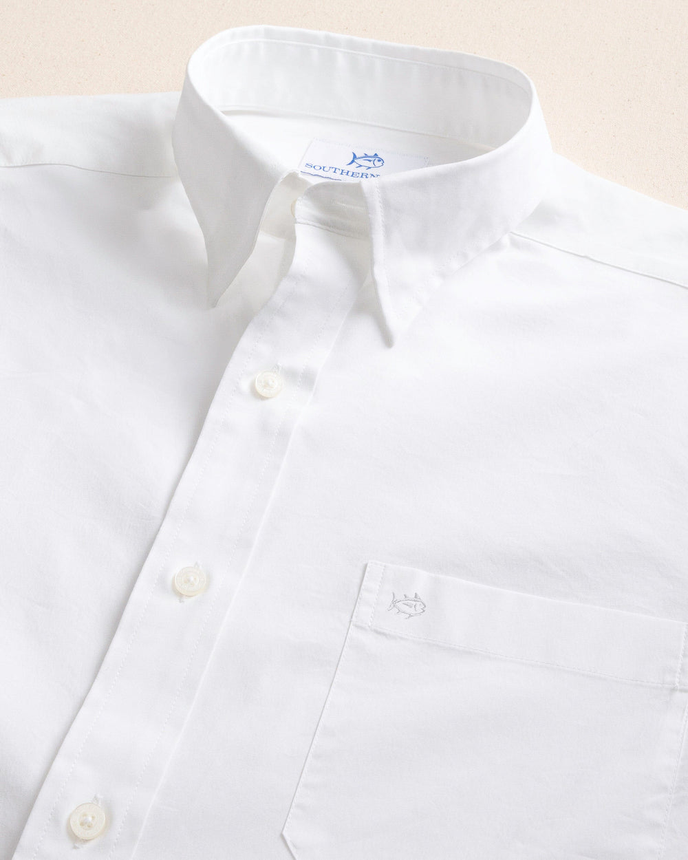 The detail view of the Southern Tide Charleston Overbrook Solid Embroidered Sport Shirt by Southern Tide - Classic White