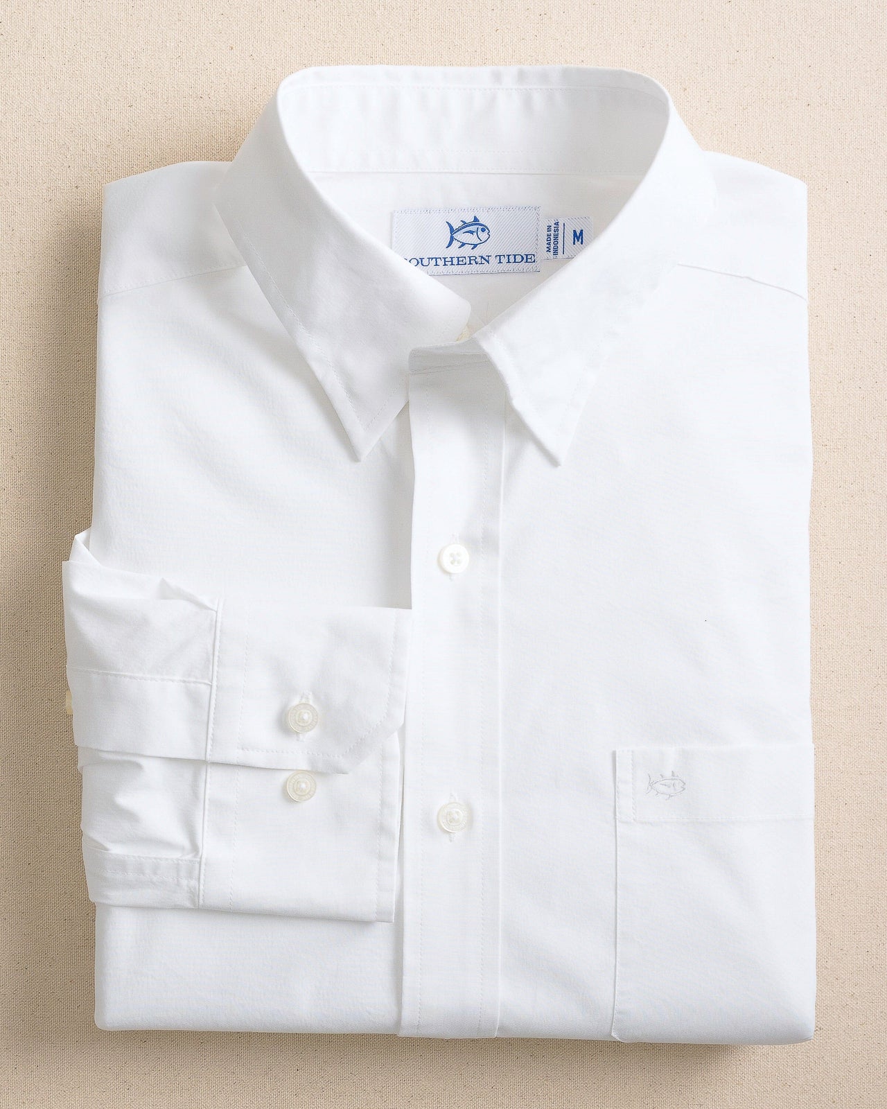 The front view of the Southern Tide Charleston Overbrook Solid Embroidered Sport Shirt by Southern Tide - Classic White