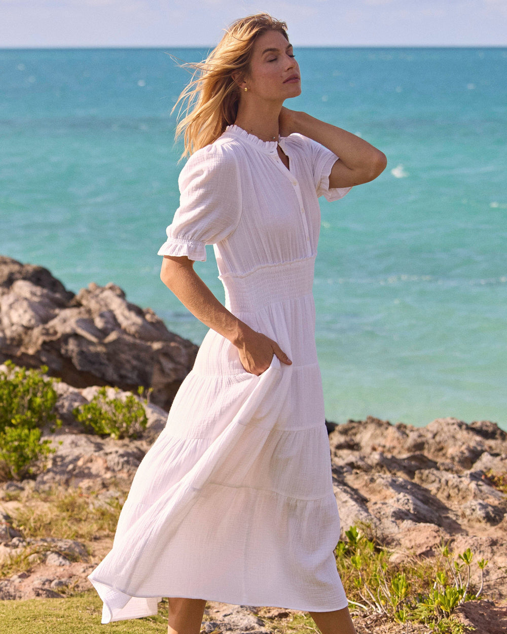 The lifestyle view of the Southern Tide Christa Short Sleeve Maxi Dress by Southern Tide - Classic White