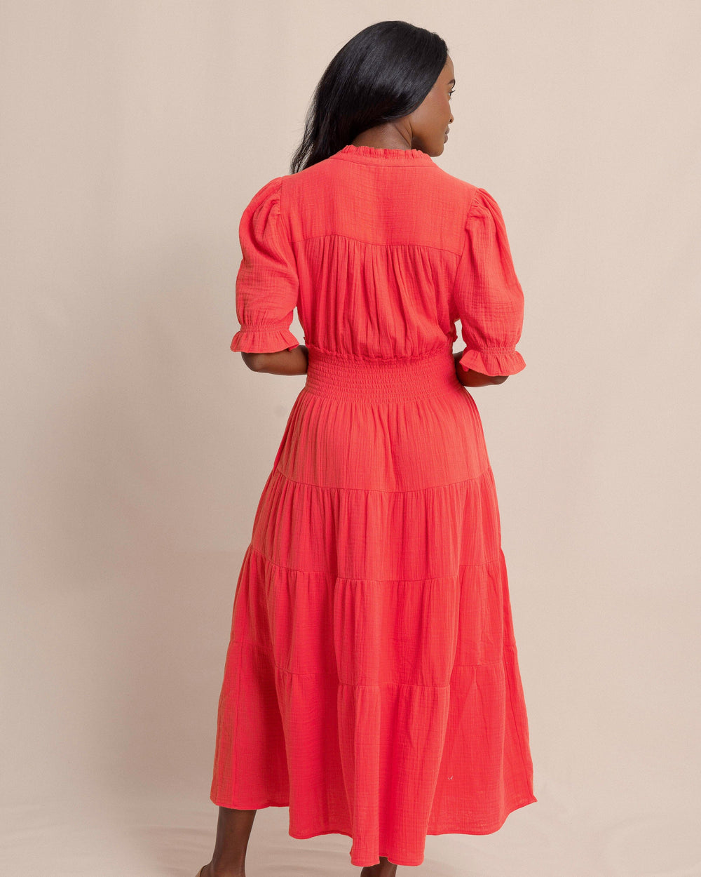 The back view of the Southern Tide Christa Short Sleeve Maxi Dress by Southern Tide - Sunset Coral
