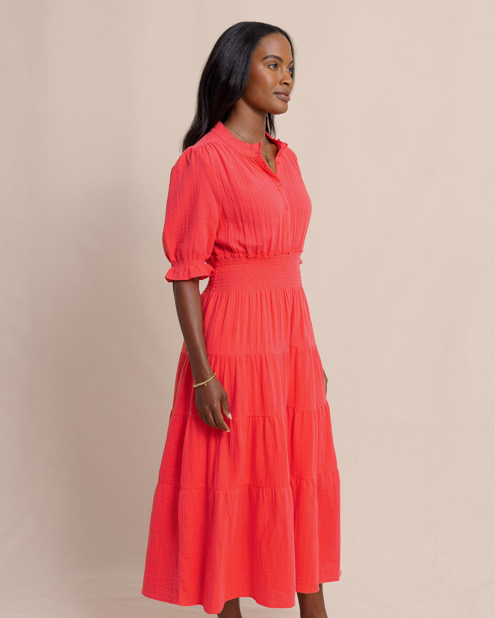The side view of the Southern Tide Christa Short Sleeve Maxi Dress by Southern Tide - Sunset Coral