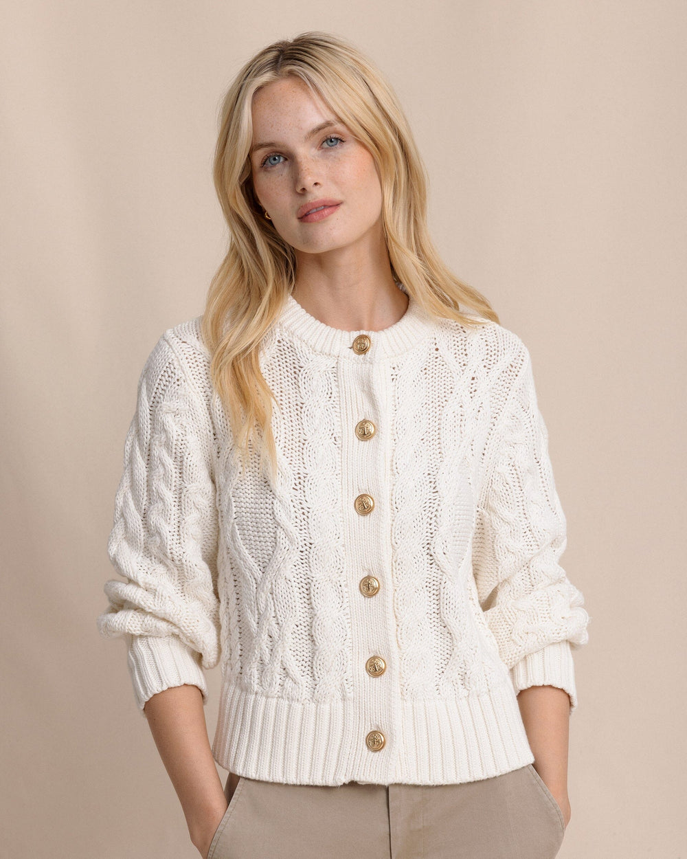The front view of the Southern Tide Clarke Cable Knit Cardigan by Southern Tide - Sand White