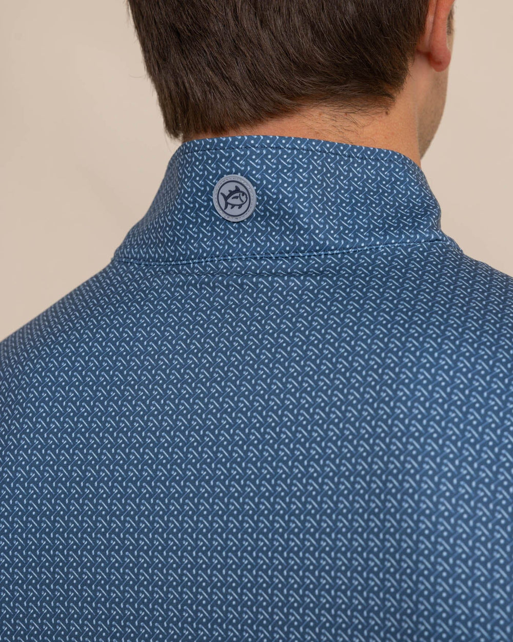 The detail view of the Southern Tide Clubbin It Print Cruiser Quarter Zip by Southern Tide - Aged Denim