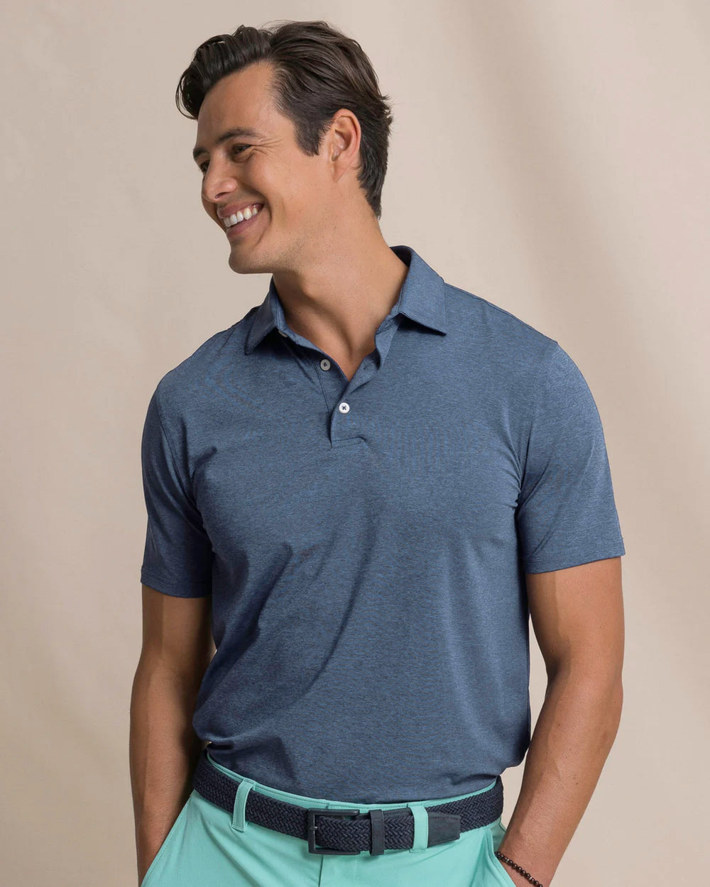 The front view of the Southern Tide Coastal Breeze® Heather Performance Polo by Southern Tide - Heather Nautical Blue