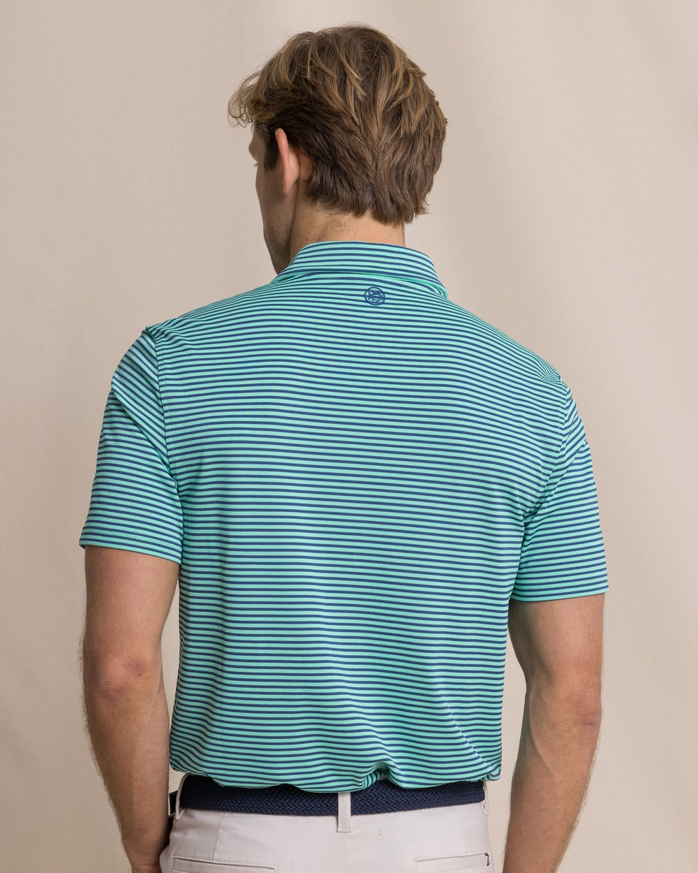 The back view of the Southern Tide Coastal Breeze® Oceanfront Stripe Pique Performance Polo by Southern Tide - Gulf Shores