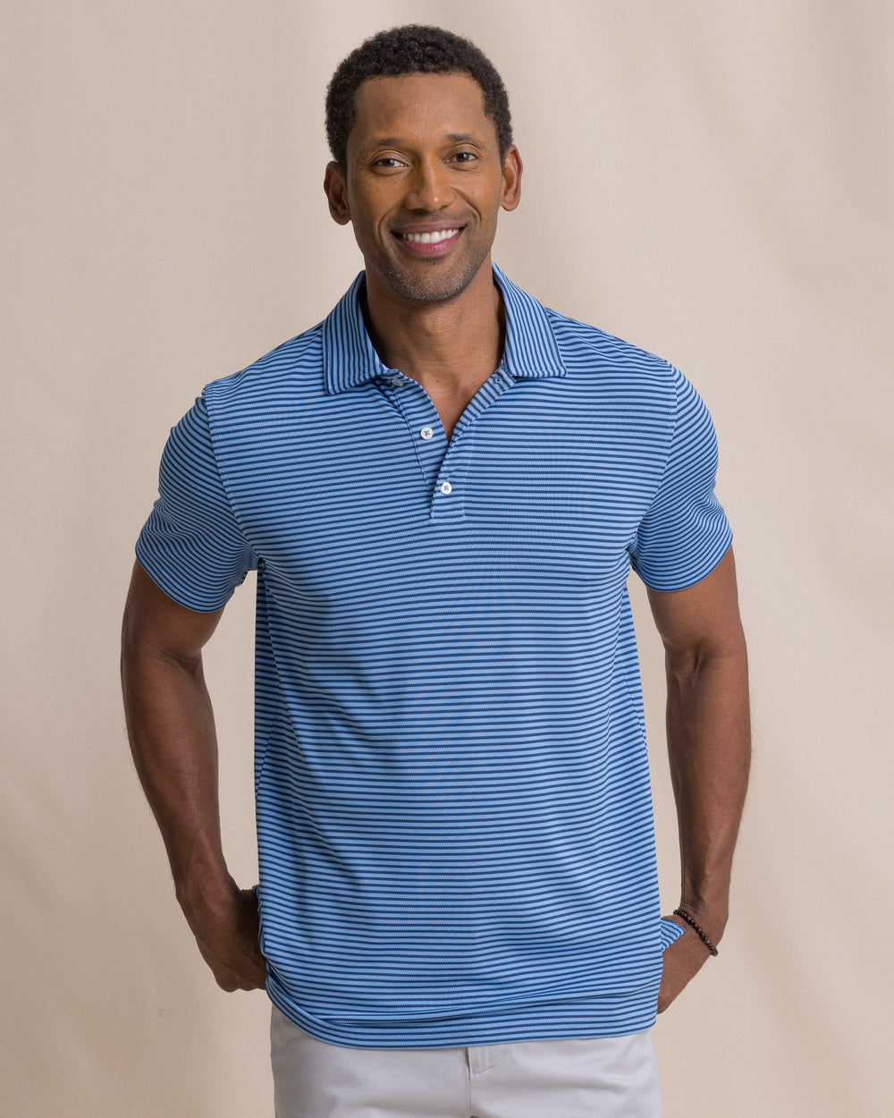 The front view of the Southern Tide Coastal Breeze® Oceanfront Stripe Pique Performance Polo by Southern Tide - Ocean Channel
