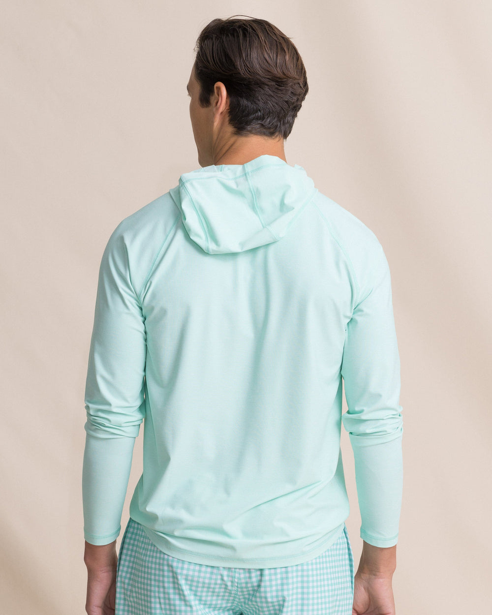 The back view of the Southern Tide Coastal Breeze® Performance Hoodie by Southern Tide - Gulf Shores