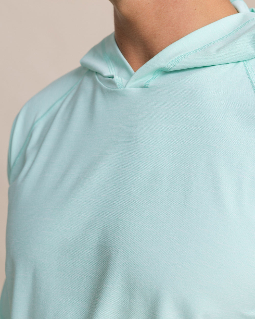 The detail view of the Southern Tide Coastal Breeze® Performance Hoodie by Southern Tide - Gulf Shores