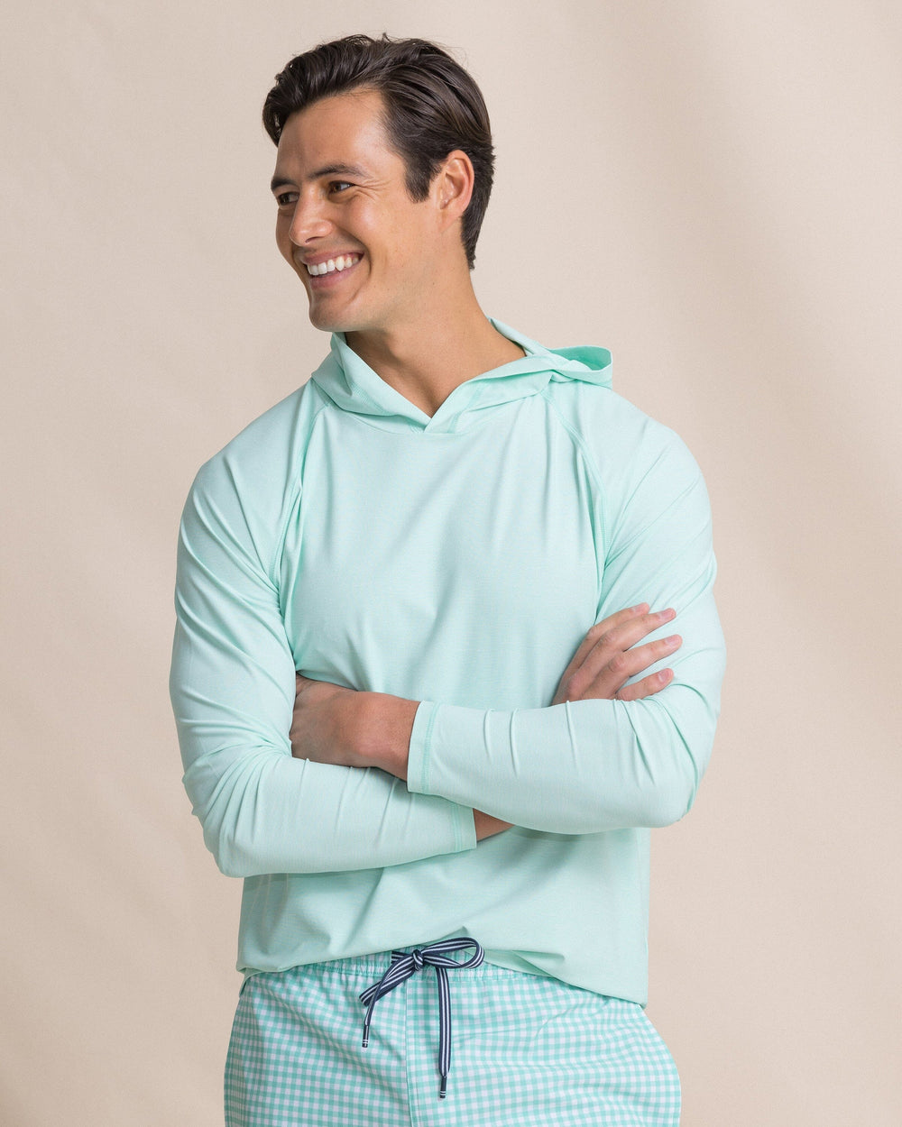 The front view of the Southern Tide Coastal Breeze® Performance Hoodie by Southern Tide - Gulf Shores