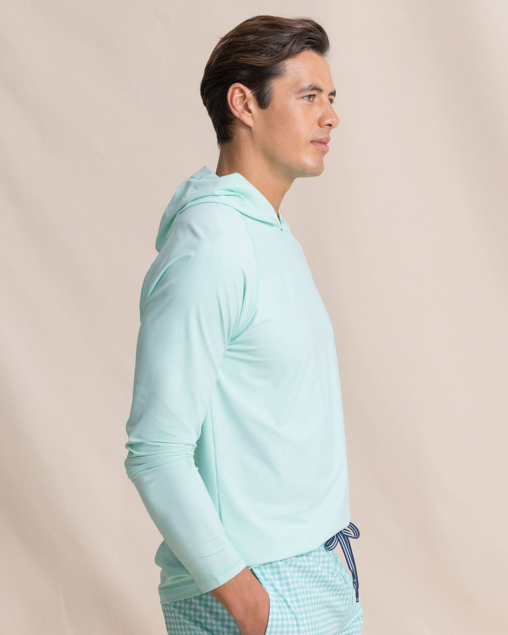 The side view of the Southern Tide Coastal Breeze® Performance Hoodie by Southern Tide - Gulf Shores