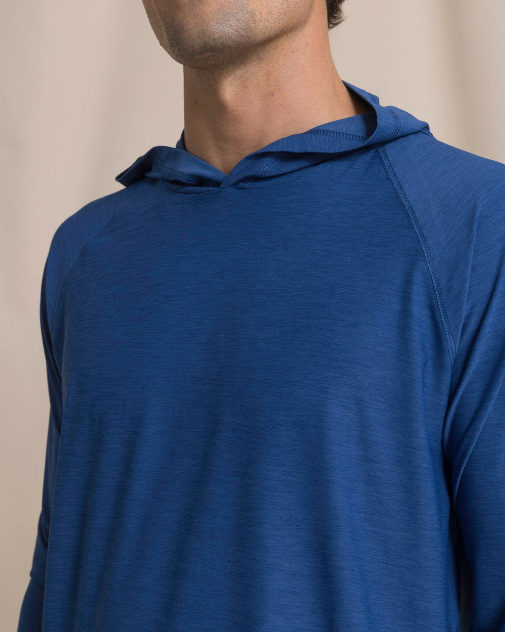 The detail view of the Southern Tide Coastal Breeze® Performance Hoodie by Southern Tide - Nautical Blue