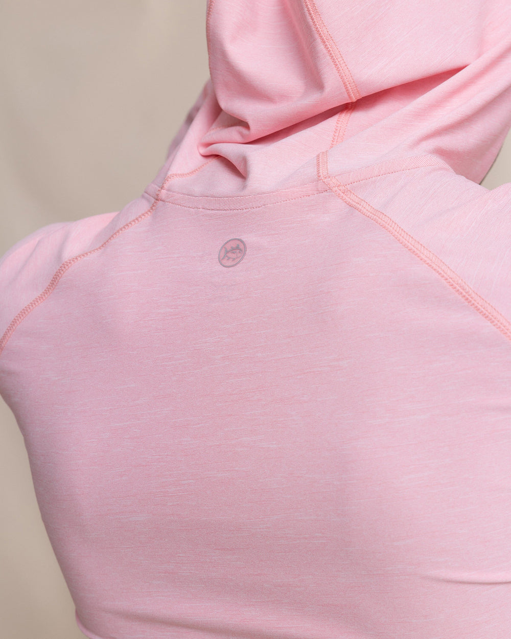 The detail view of the Southern Tide Coastal Breeze® Performance Hoodie by Southern Tide - Sea Pink