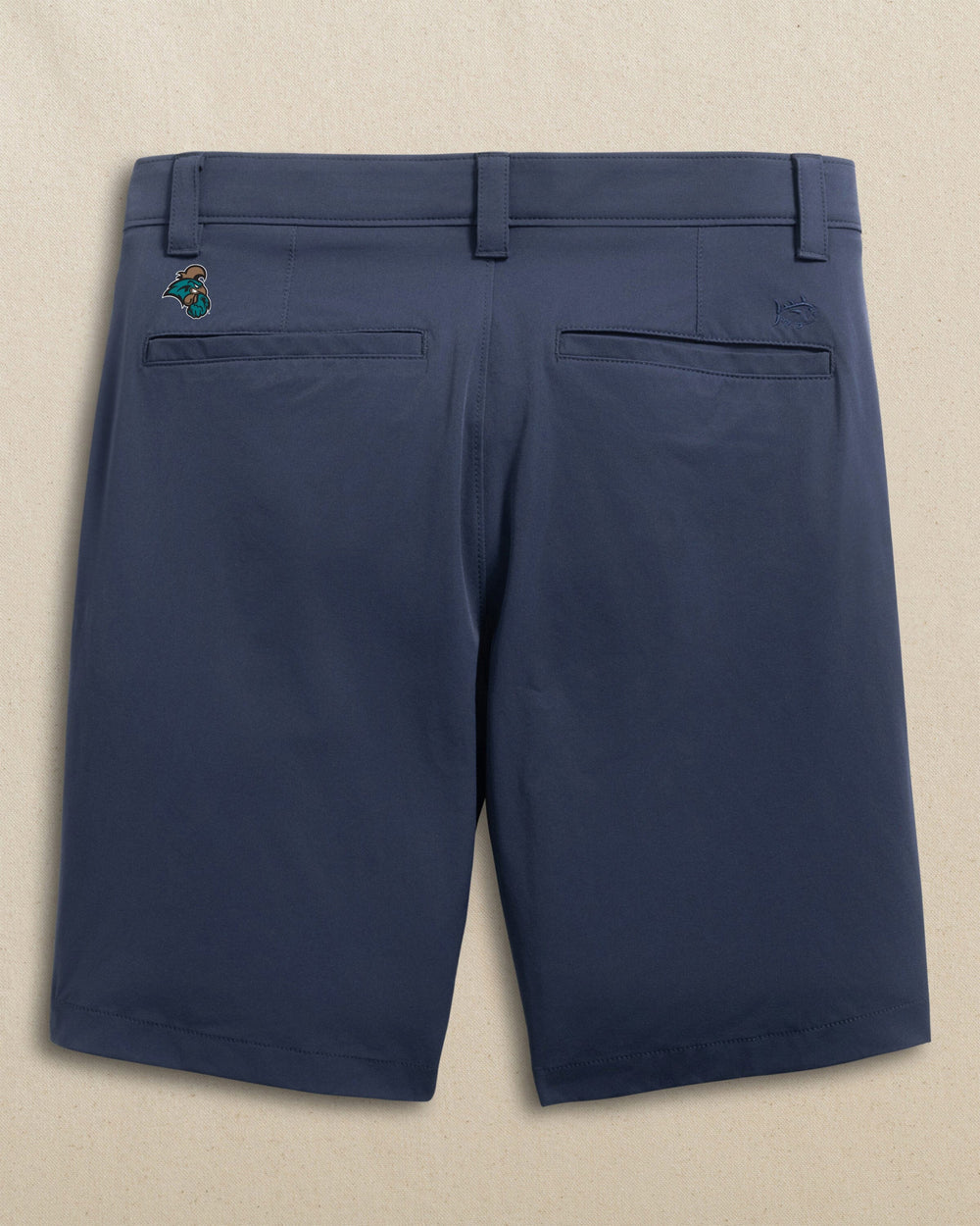 The back view of the Southern Tide Coastal Carolina Chanticleers Birdie 8" Coastal Breeze® Performance Short by Southern Tide - True Navy