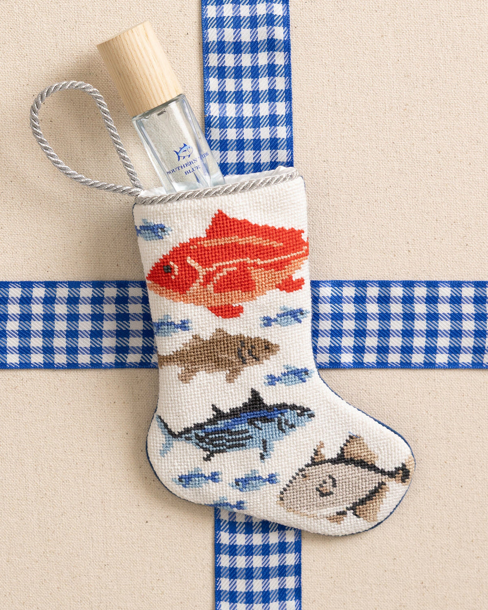 The front view of the Southern Tide Coastal Catch Needlepoint Stocking by Southern Tide - White