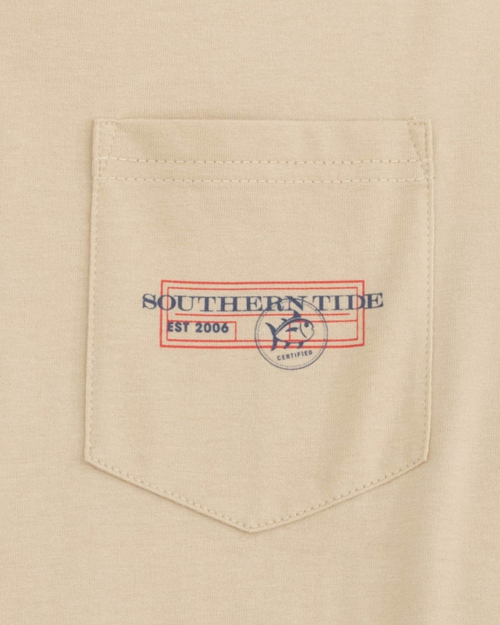 The detail view of the Southern Tide Coastal Fishing License Short Sleeve T-Shirt by Southern Tide - Irish Cream