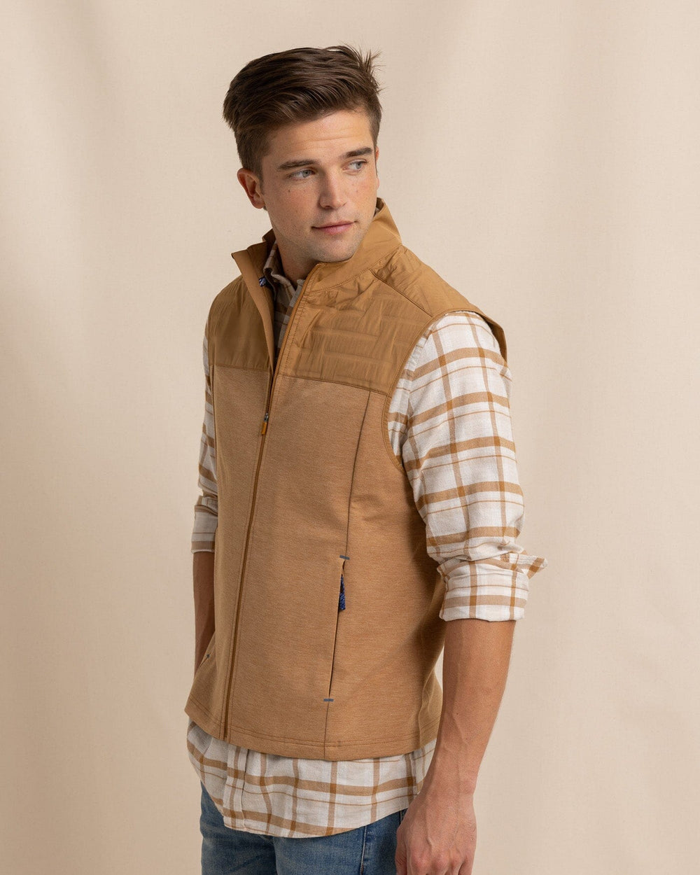 The side view of the Southern Tide Coligny Quilted Vest by Southern Tide - Hazelnut Khaki