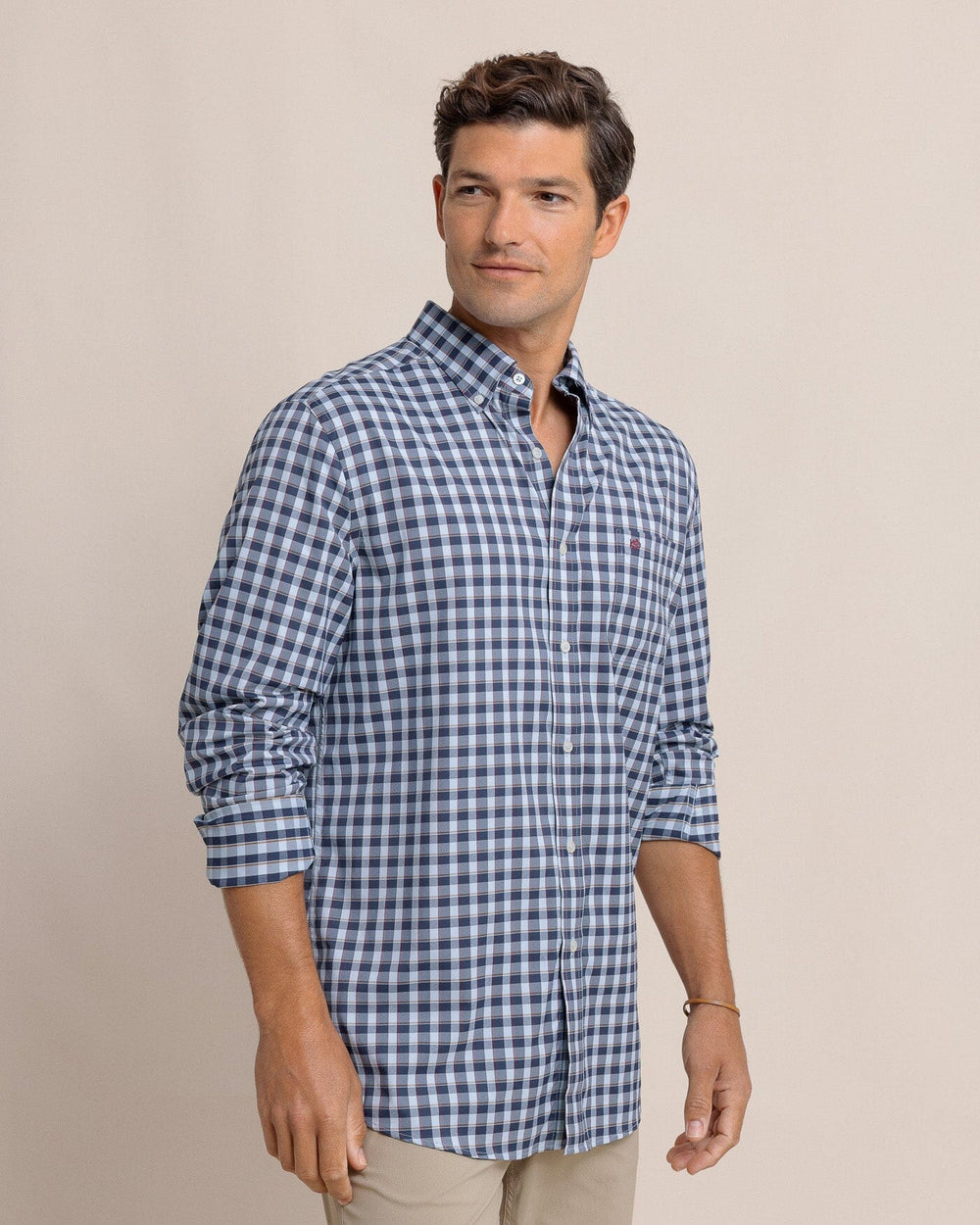 The side view of the Southern Tide Colleton Plaid Intercoastal Long Sleeve Sport Shirt by Southern Tide - Dress Blue