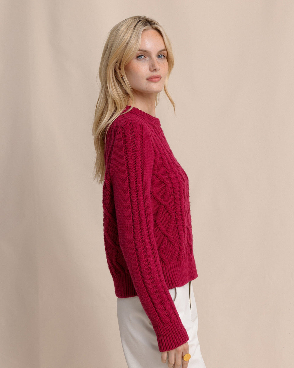 The side view of the Southern Tide Connie Cable Knit Sweater by Southern Tide - Carolina Plum
