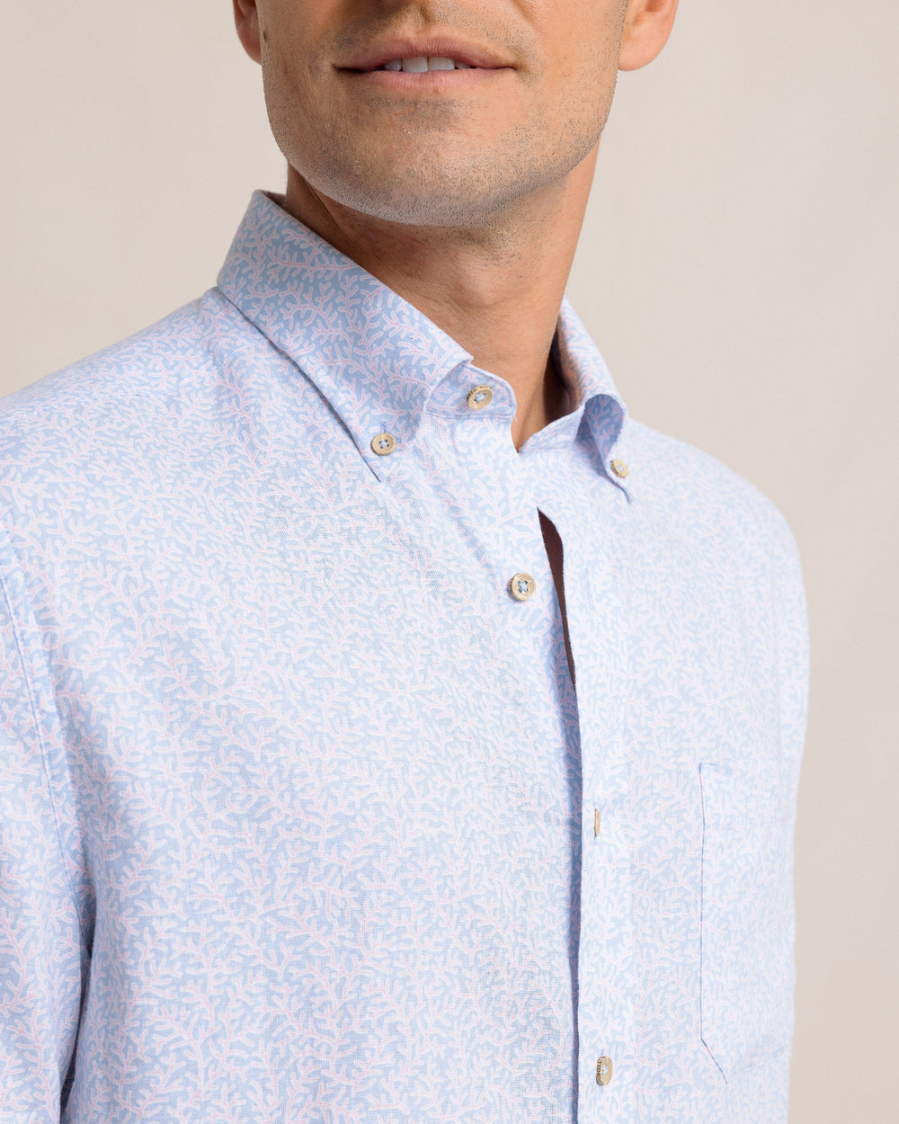 The detail view of the Southern Tide Coral Life Linen Rayon Short Sleeve Sport Shirt by Southern Tide - Cerulean