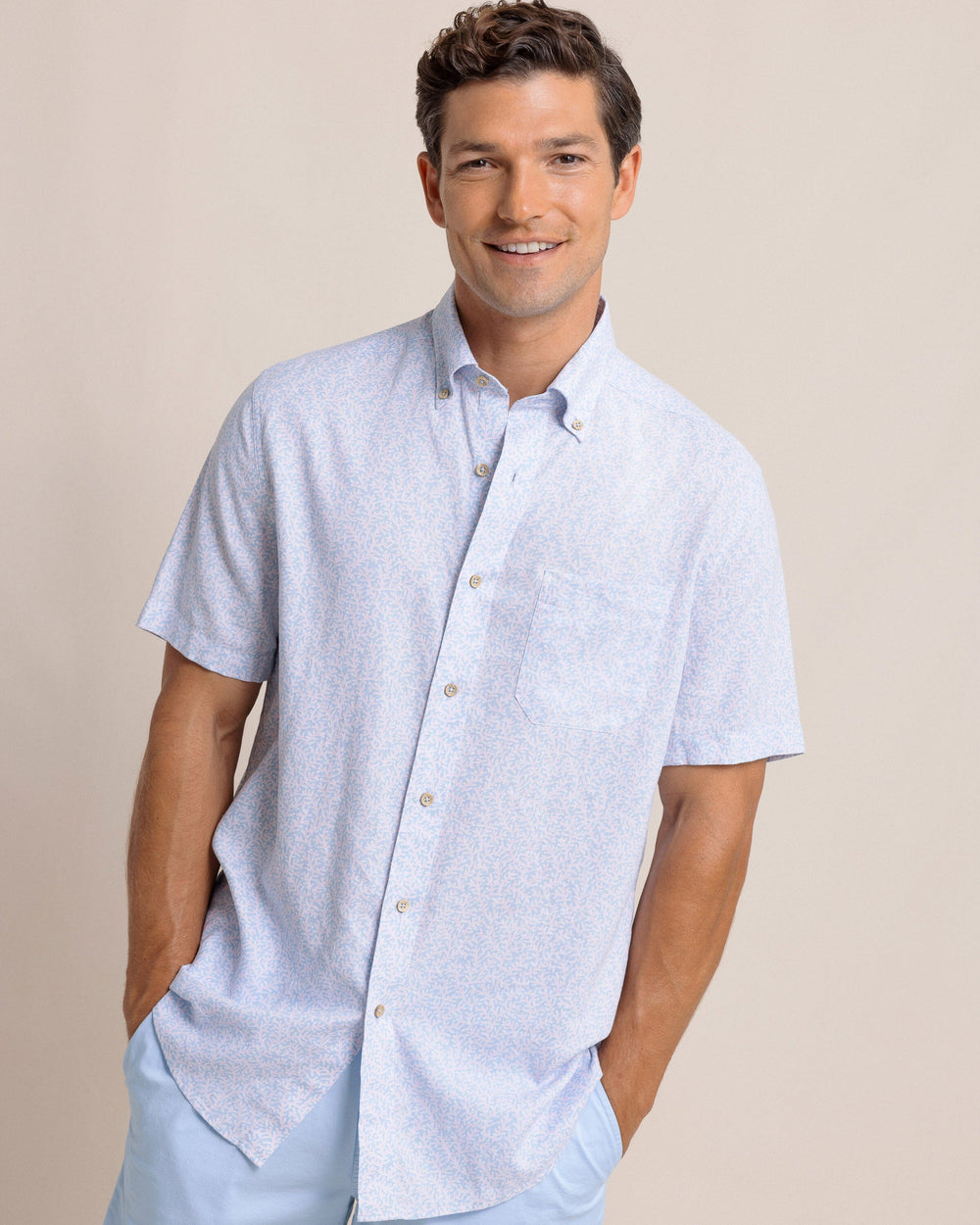 The front view of the Southern Tide Coral Life Linen Rayon Short Sleeve Sport Shirt by Southern Tide - Cerulean