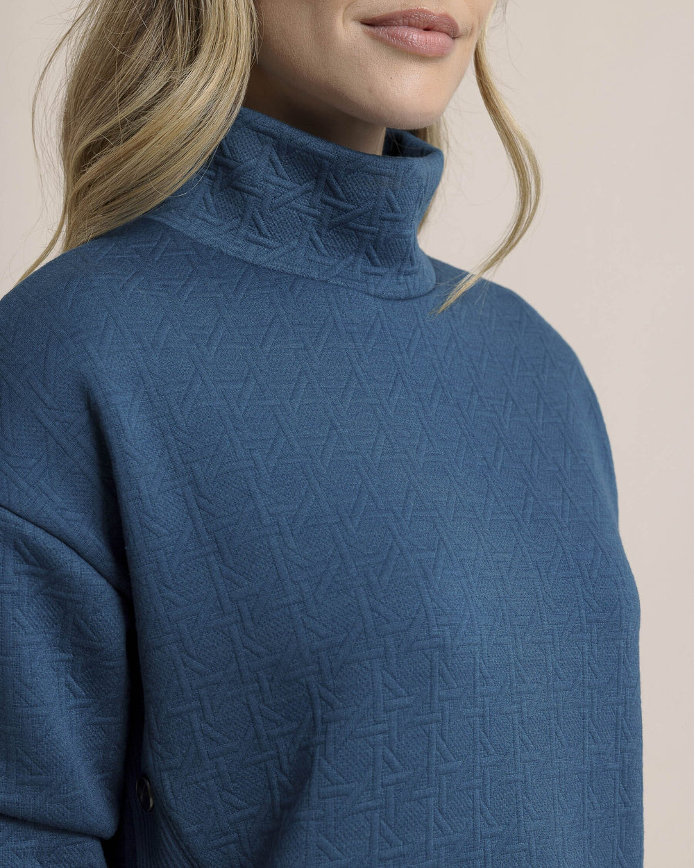 The detail view of the Southern Tide Cordelia Quilted Pullover by Southern Tide - Teal Haze