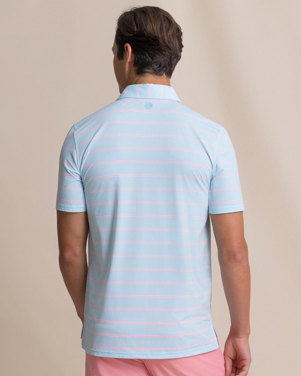 The back view of the Southern Tide Core Sound Stripe Coastal Breeze® Performance Polo by Southern Tide - Tropical Breeze Blue