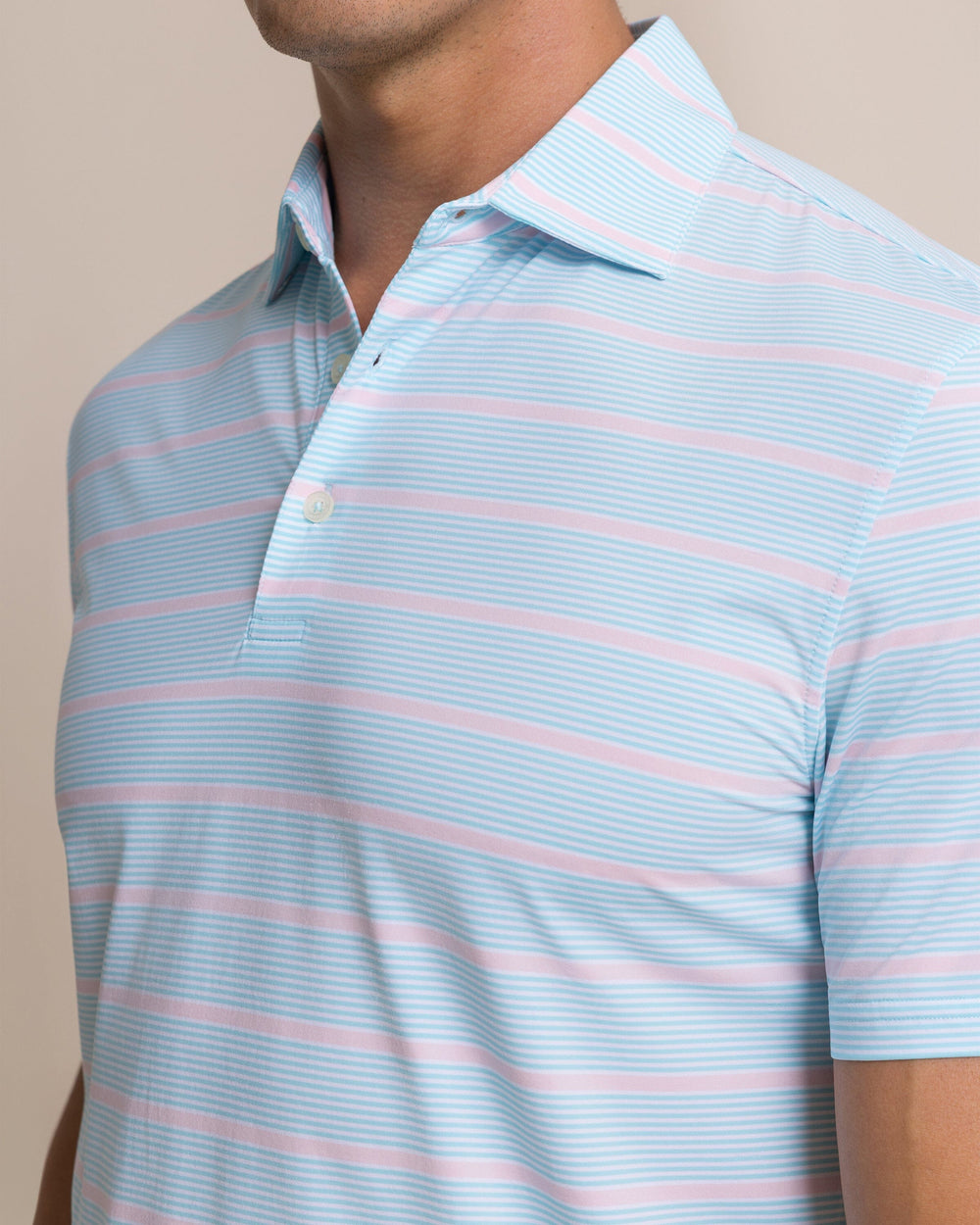 The detail view of the Southern Tide Core Sound Stripe Coastal Breeze® Performance Polo by Southern Tide - Tropical Breeze Blue
