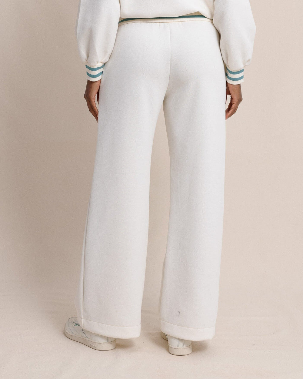 The back view of the Southern Tide Cosette Luxe Lounge Wide Leg Pant by Southern Tide - Sand White