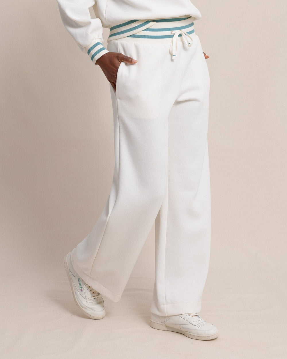 The side view of the Southern Tide Cosette Luxe Lounge Wide Leg Pant by Southern Tide - Sand White