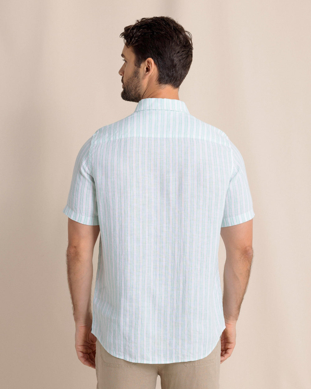 The back view of the Southern Tide Crepe Myrtle Striped Linen Short Sleeve Sport Shirt by Southern Tide - Jade Green