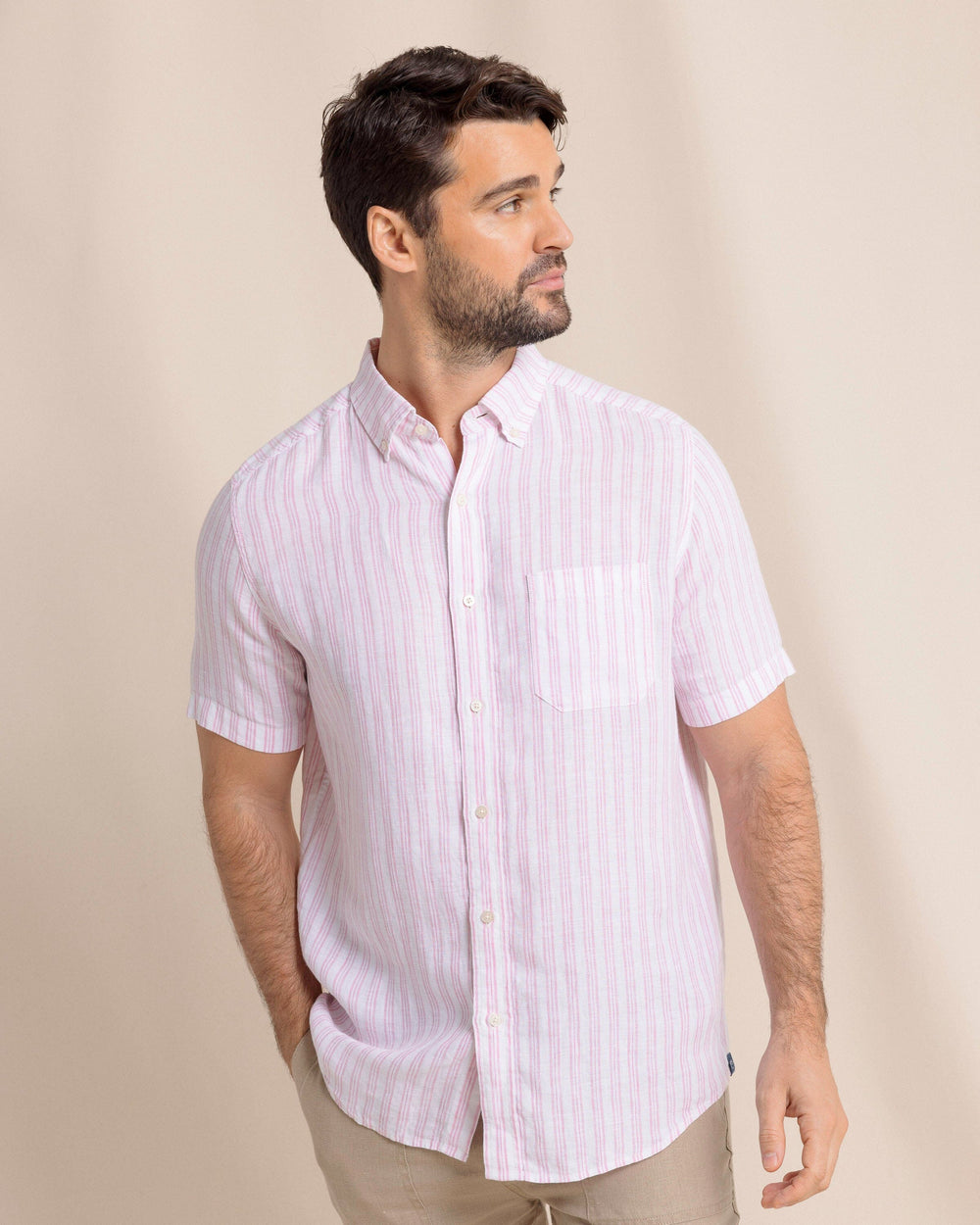 The front side view of the Southern Tide Crepe Myrtle Striped Linen Short Sleeve Sport Shirt by Southern Tide -  Riviera Rose