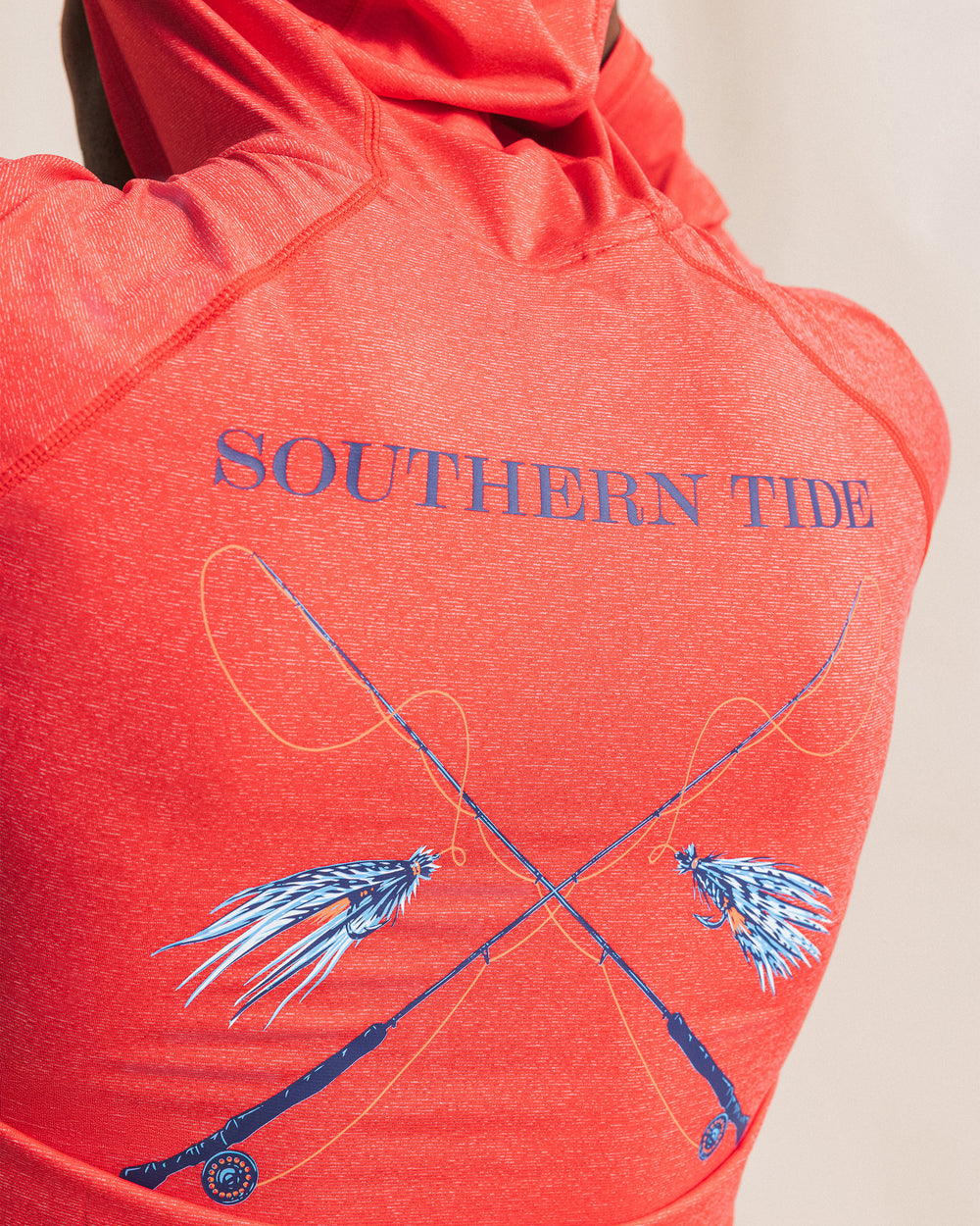 The detail view of the Southern Tide Crossed Lines Coastal Breeze® Performance Hoodie by Southern Tide - Channel Marker Red