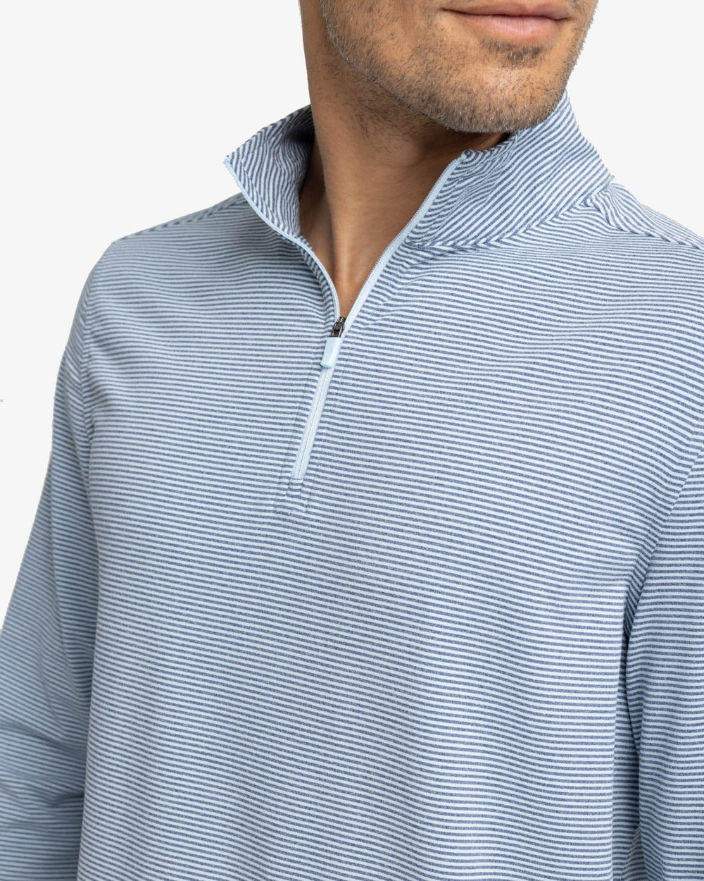 The detail view of the Southern Tide Cruiser Heather Micro-Stripe Performance Quarter Zip Pullover by Southern Tide - Heather Dream Blue