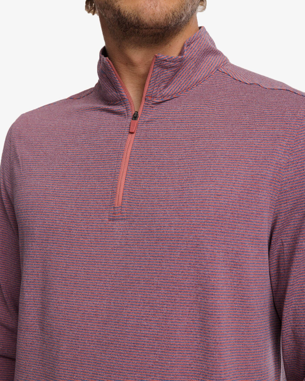 The detail view of the Southern Tide Cruiser Heather Micro-Stripe Performance Quarter Zip Pullover by Southern Tide - Heather Dusty Coral