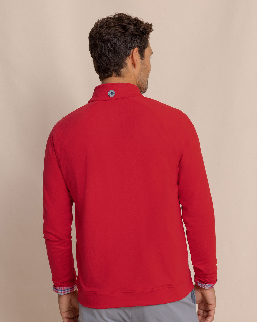 The back view of the Southern Tide Cruiser Heather Quarter Zip Pullover by Southern Tide - Heather Crab Red
