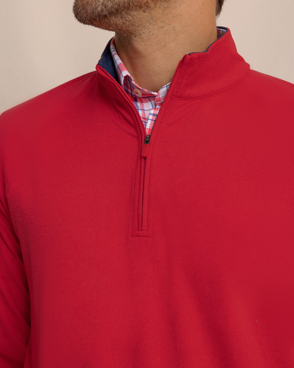 The detail view of the Southern Tide Cruiser Heather Quarter Zip Pullover by Southern Tide - Heather Crab Red