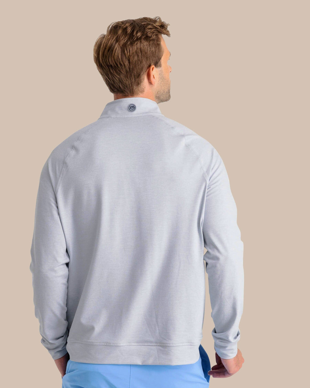 The back view of the Southern Tide Cruiser Heather Quarter Zip by Southern Tide - Heather Slate Grey