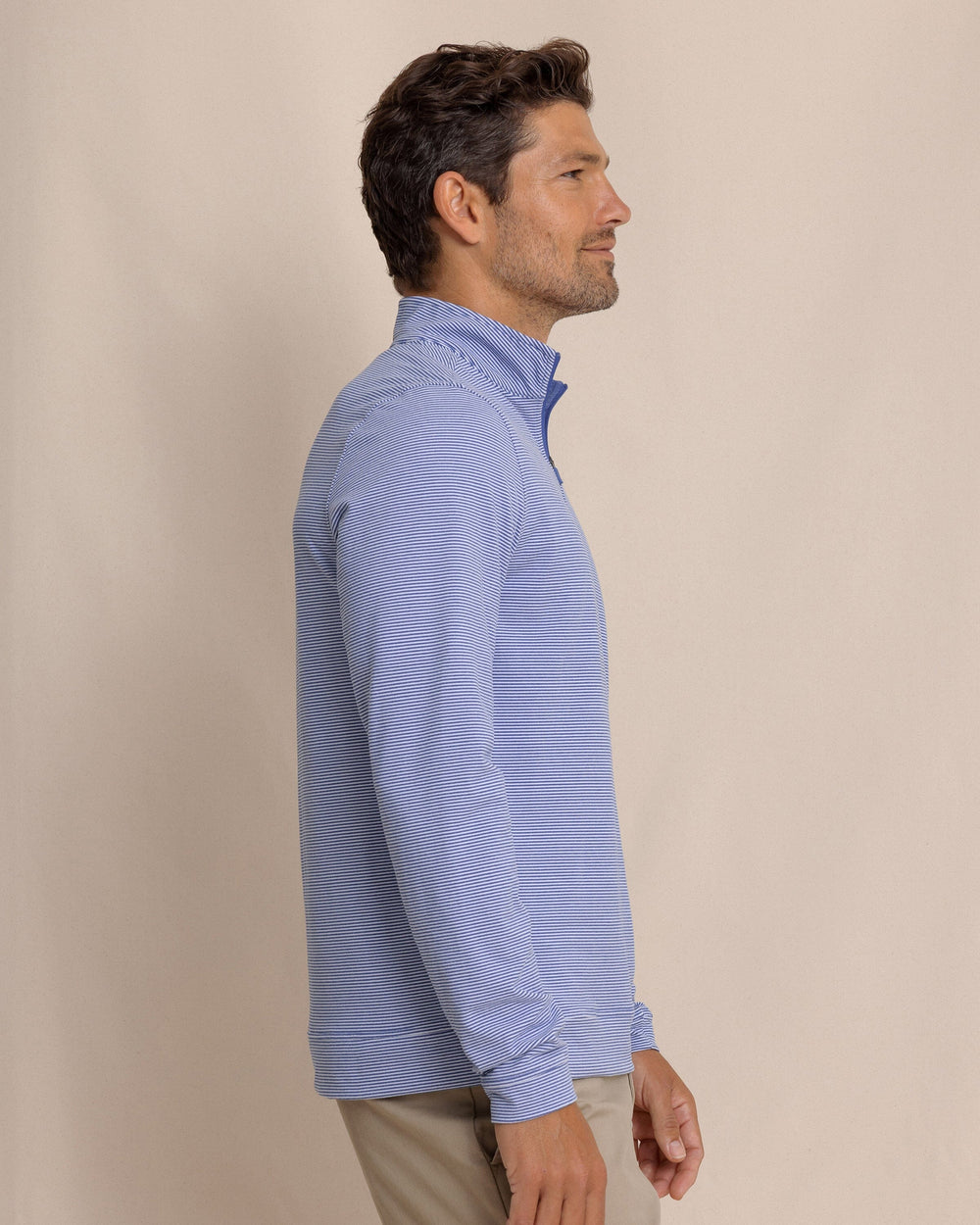 The side view of the Southern Tide Cruiser Micro-Stripe Heather Quarter Zip by Southern Tide - Heather University Blue