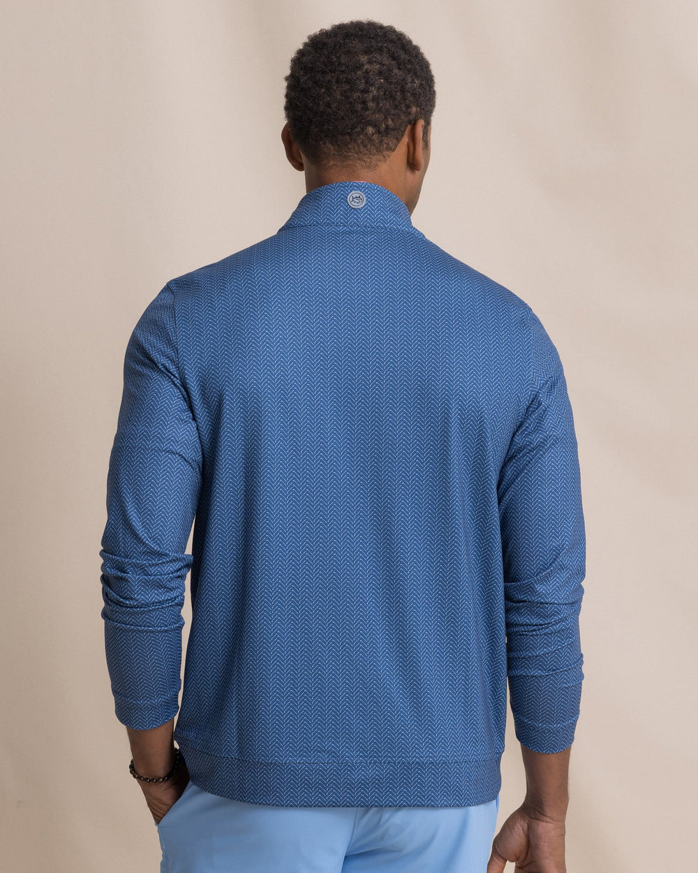The back view of the Southern Tide Cruiser Raise The Par Printed Quarter Zip by Southern Tide - Nautical Blue