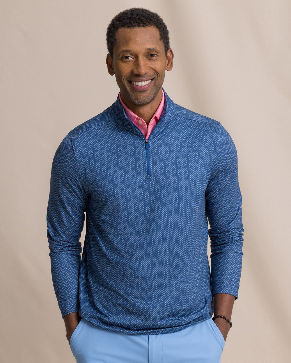 The front view of the Southern Tide Cruiser Raise The Par Printed Quarter Zip by Southern Tide - Nautical Blue
