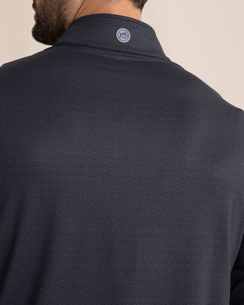 The back detail view of the Southern Tide Cruiser ST Geo Printed Quarter Zip by Southern Tide - Caviar Black